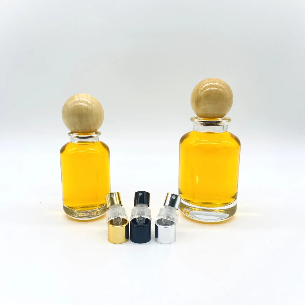 Hot Sell 50ml 100ml Cylinder Glass Perfume Bottle with Round Wooden Cap